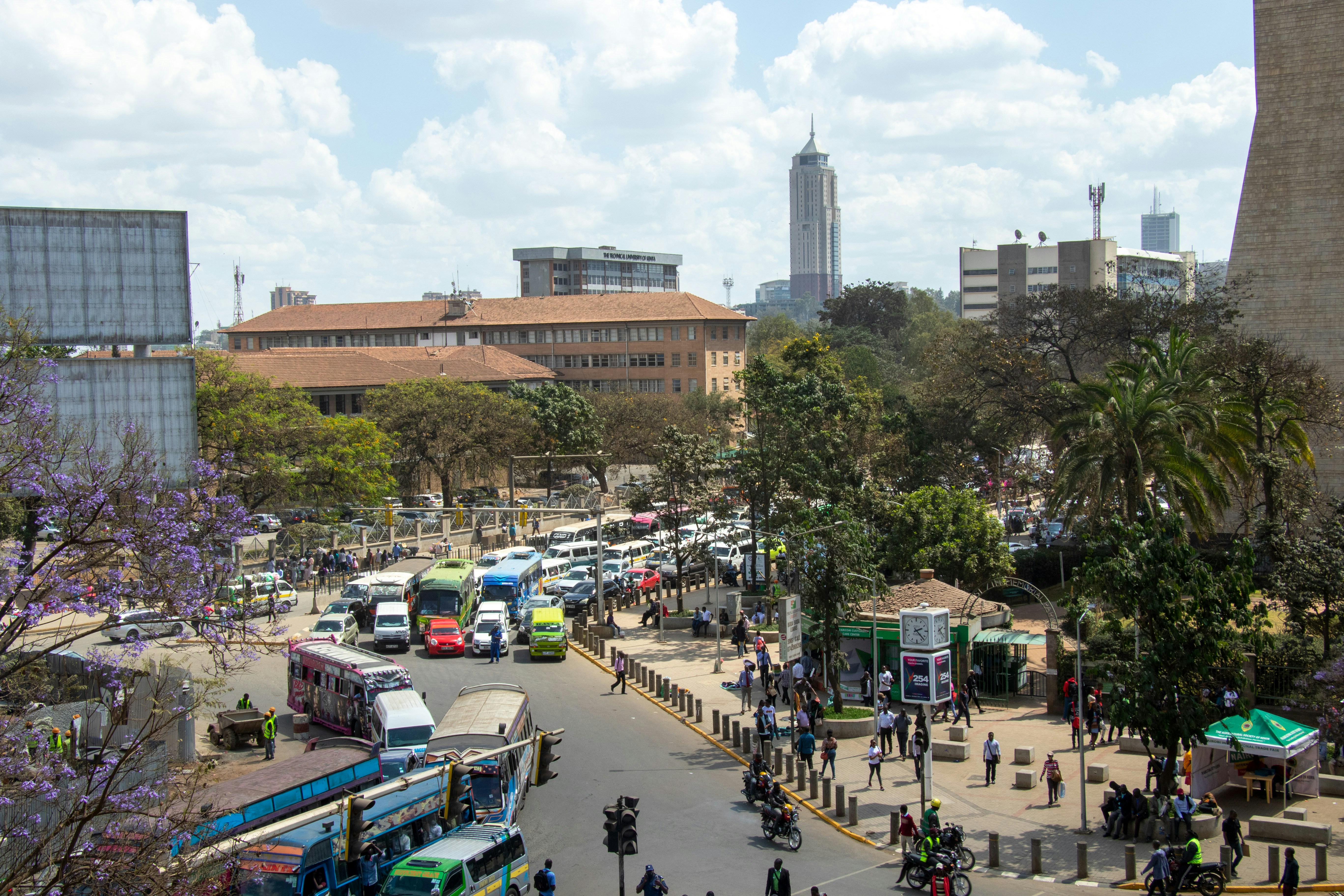 Busy matatu traffic and skyline in downtown Nairobi, Kenya