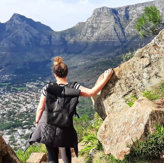 Hiker with backpack above Cape Town